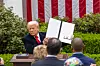 U.S. President Donald Trump shows an executive order on ″reciprocal tariffs″ at the Rose Garden of the White House in Washington on April. [XINHUA/YONHAP]