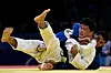 Korean judoka Kim Dong-hoon, front, competes against Uchkun Kuranbaev of Uzbekistan in the men’s -73 kilogram bronze medal contest at the 2024 Paris Paralympic Games in Paris on Friday. [AFP/YONHAP]