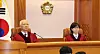 Justices Cheong Hyung-sik, left, and Lee Mi-son lead the preparatory hearing for President Yoon Suk Yeol's impeachment trial at the Constitutional Court in Jongno District, central Seoul, on Dec. 27. [NEWS1]
