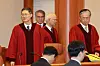 From left: Justices Moon Hyung-bae, Cho Han-chang, Cheong Hyung-sik and Kim Hyung-du enter the main chamber of the Constitutional Court in Jongno District, central Seoul on March 24. [JOINT PRESS CORPS]
