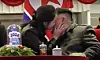 North Korean leader Kim Jong-un is seen being kissed on the cheek by his daugher Kim Ju-ae during a New Year's celebration at the Kumsusan Palace of the Sun on Jan. 1. [YONHAP]
