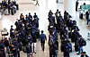 Cambodian workers arriving on E-9 visas line up to wait for transportation at Incheon International Airport on the morning of May 27. [NEWS1]