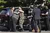K-pop band BTS members Jimin, center left, and Jungkook, center right, are greeted after being discharged from a mandatory military service in Yeoncheon, Gyeonggi, on June 11, 2025. [AP/YONHAP]
