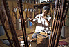 Yoo Se-hyun, an intangible cultural asset for his skills in making traditional arrows, checks on the shaft to see whether the shaft is twisted or not at his studio located in Young Jip Bows & Arrows Museum in Paju, Gyeonggi. [PARK SANG-MOON]