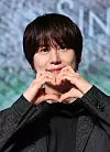 Kyuhyun poses for photos at a press conference held on Jan. 8 at Hotel Naru Seoul MGallery in Mapo District, western Seoul. [NEWS1]