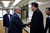 Pak Chon-jong, front right, vice minister of North Korea Physical Culture and Sports, shakes hands with Riccardo Fraccari, president of the World Baseball Softball Confederation, upon his arrival at Pyongyang International Airport in Pyongyang on July 19. [AFP/YONHAP]