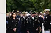 Director of National Intelligence Tulsi Gabbard, left, looks on before President Donald Trump arrives to deliver a Memorial Day Address at the 157th National Memorial Day Observance at Arlington National Cemetery, Monday, May 26, in Arlington, Virginia. [AP/YONHAP]