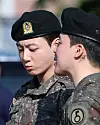 Members Jungkook, left, and Jimin of boy band BTS on June 11 in Yeoncheon, Gyeonggi, after finishing their mandatory military duties [NEWS1]