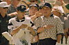 Shigeki Maruyama, right, talks to Craig Parry during the 1998 Presidents Cup at Royal Melbourne Golf Club in Australia in December, 1998.  [GETTY IMAGES]
