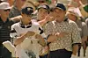 Shigeki Maruyama, right, talks to Craig Parry during the 1998 Presidents Cup at Royal Melbourne Golf Club in Australia in December, 1998. [GETTY IMAGES]