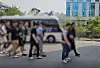 A gang member charged with operating an illegal gambling site is sent to the prosecutors' office on May 30. [GYEONGGI NAMBU PROVINCIAL POLICE AGENCY]