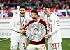 From left: Bayern Munich's Kim Min-jae, Thomas Muller and Hiroki Ito celebrate winning the 2024-25 Bundesliga title at Allianz Arena in Munich, Germany on May 10. [REUTERS/YONHAP]