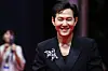 Actor Lee Jung-jae walks down the red carpet ahead of the festival's opening ceremony held at the Busan Cinema Center in Haeundae District on Wednesday. [YONHAP]