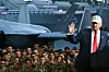 U.S. President Donald Trump delivers a speech in front of U.S. Navy personnel on board the U.S. Navy's USS George Washington aircraft carrier at the naval base in Yokosuka, Japan on Oct. 28. [AFP/YONHAP]