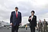 U.S. President Donald Trump and Japanese Prime Minister Sanae Takaichi are welcomed by U.S. military personnel upon their arrival on the USS George Washington docked at the Yokosuka Naval Base, south of Tokyo, Japan, on Oct. 28. [EPA/YONHAP]