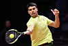 Carlos Alcaraz of Spain in action against Jannik Sinner of Italy during the Hyundai Card Super Match against Carlos Alcaraz of Spain in Incheonon Jan. 10. [EPA/YONHAP]