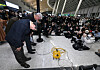 From left, Jeju Air CEO Kim E-bae and Aekyung Group Vice Chairman Choi Hyung-seok apologize to families of the victims who died on the Jeju Air Flight 2216 crash at Muan International Airport on Dec. 29. [YONHAP]
