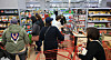 Shoppers purchase goods at a supermarket in Seoul on Nov. 3. [NEWS1]