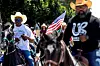 Riders organized by Connecting Compton ride in a ″cabalgata″ for human rights, following multiple detentions by Immigration and Customs Enforcement (ICE), in the Los Angeles County city of Compton, California, on June 22. [REUTERS/YONHAP]