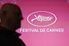 A man passes next to the logo of the Cannes Film Festival before the press conference to present the 78th Cannes Film Festival Official Selection on April 10. [EPA/YONHAP]