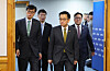 Minister of Economy and Finance Choi Sang-mok, front right, and Bank of Korea Gov. Rhee Chang-yong enter a meeting room for an emergency meeting on macroeconomic and financial issues in central Seoul on Dec. 19. [YONHAP]