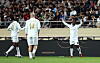 Shield United's Clarence Seedorf, right, celebrates scoring during the Nexon Icons Match against FC Spear at Seoul World Cup Stadium in western Seoul on Sunday. [YONHAP]