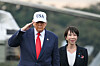 U.S. President Donald Trump, left, and Japan's Prime Minister Sanae Takaichi arrive on board the U.S. Navy's USS George Washington aircraft carrier at the U.S. naval base in Yokosuka on Oct. 28, 2025. [AFP/YONHAP]