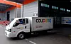 Delivery trucks for e-commerce platform Coupang leave a distribution center in Seoul in 2018. [REUTERS/YONHAP]