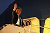 U.S. President Donald Trump waves as he boards Air Force One at Calgary International Airport in Canada on June 16, leaving the G7 summit early to head back to Washington. [AP/YONHAP]