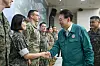 President Yoon Suk Yeol, right, greets a soldier during a visit to the Army’s Ground Operations Command in Yongin, Gyeonggi, where he was briefed on the ongoing Ulchi Freedom Shield combined exercise with the United States which began Monday for an 11-day run. [PRESIDENTIAL OFFICE]