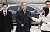 Former Prime Minister Han Duck-soo leaves the Seoul Central District Court on Nov. 26, 2025, after the conclusion of his sentencing hearing. [KANG JUNG-HYUN]