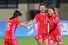Korea's Jeon Eun-ha, right, celebrates after scoring a goal during a Group E match at the Hangzhou Asian Games against Myanmar at Wenzhou Sports Centre Stadium in Wenzhou, China on Friday. [YONHAP]