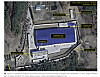 Satellite imagery taken on Nov. 13 shows six heat exchangers installed around a blue-roofed building believed to house uranium enrichment equipment at North Korea’s nuclear complex in Yongbyon, North Pyongan Province. [SCREEN CAPTURE]