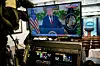 A television monitor displays U.S. President Donald Trump during a prime-time address to the nation in the James S. Brady Press Briefing Room of the White House in Washington on Dec. 17. [EPA/YONHAP]