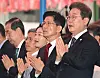 Democratic Party presidential candidate Lee Jae-myung, far right, and People Power Party presidential candidate Kim Moon-soo, second from right, attend a Buddhist ceremony for Buddha's Birthday at Jogye Temple in Jongno District, central Seoul, on May 5, 2025. [YONHAP]