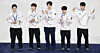 Members of the Korean men's 5,000-meter short track speed skating relay team celebrate on the podium after winning the silver medal at the 2026 Winter Olympics at Milano Ice Skating Arena in Milan on Feb. 20. From left: Shin Dong-min, Rim Jong-un, Lee June-seo, Lee Jeong-min and Hwang Dae-heon. [YONHAP]