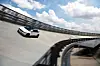 An Ioniq 5 speeds across the Skytrack on the roof of the Hmgics. [HYUNDAI MOTOR]