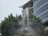 A drone carrying mosquito repellent smoke fly above the Daechi Reservoir Sports Park in Gangnam District, southern Seoul, spraying the repellent into the park on May 29. [JOONGANG ILBO]