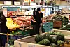 Shoppers look around produce at a large shopping mart in Seoul on May 23. [YONHAP]