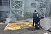 Seoul city officials spray mosquito repellent smoke in central Seoul on May 28. [JOONGANG ILBO]