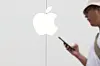 A passerby walks by an Apple store in Seoul on Sept. 19, 2024. [YONHAP]