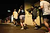 Runners make their way through a neighborhood in central Seoul on a weeknight in June. [HAN STRIDE]