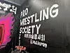 One wall of the PWS Korea studio. If pro wrestling were a font, it'd be in caps lock. [PWS KOREA]