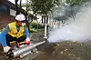 Deagu city officials spray mosquito repellent smoke in southern Daegu on Aug. 8, 2024. [NEWS1]