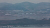 A hazy view of North Korea is seen from Odusan Observatory in Paju, Gyeonggi, on Feb. 10, marking 10 years since the suspension of operations at the Kaesong Industrial Complex. [NEWS1/YONHAP]
