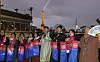 Members of a civic group hold lanterns promoting Busan’s World Expo 2030 bid near the Seine River in Paris on Monday, on the eve of the final vote determining the host city by the France-headquartered Bureau International des Expositions (BIE). [YONHAP]
