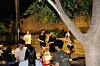 The group runs down the street separating a stretch of trendy restaurants and the stone wall bordering Jongmyo Shrine in central Seoul. [HAN STRIDE]