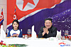 Kim Ju-ae, left, and North Korean leader Kim Jong-un at an event celebrating the lauching of its spy satellite on Nov. 23. [KOREAN CENTRAL NEWS AGENCY]