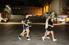 Runners check their watches as they close in on the finish line at Gwanghwamun Square in central Seoul. [HAN STRIDE]