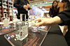 Visitors sample vegan perfumes at a vegan exhibition held at Coex in southern Seoul on July 18. [YONHAP]
